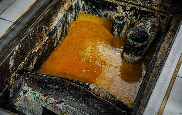 you should schedule grease trap cleaning for your dining establishment at least every 90 days to prevent buildup